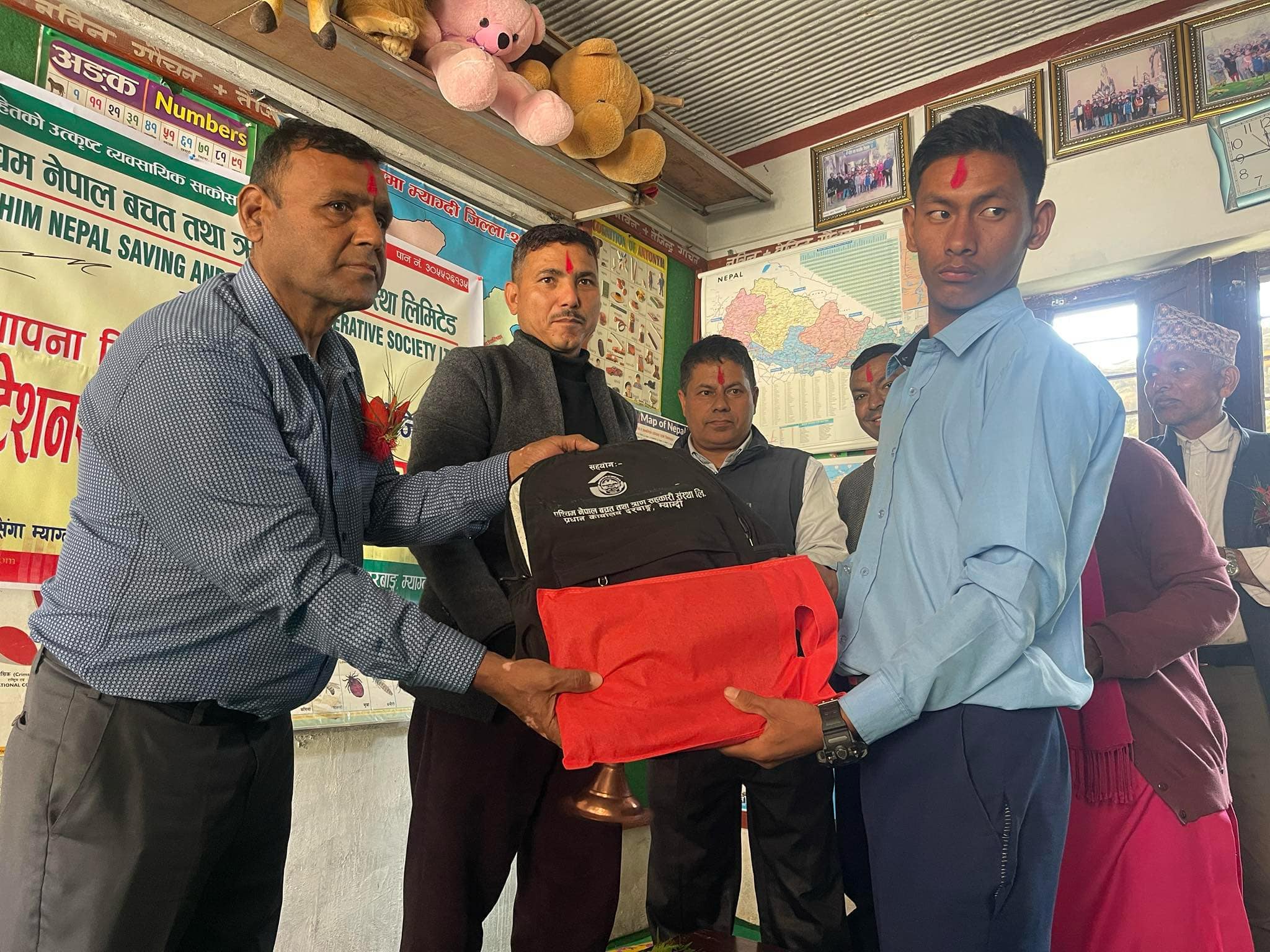 संस्थाको १८ औं स्थापना दिवसको अवसरमा आयोजना गरिएको धवलागिरी मा.बि का सुस्त श्रवन छात्र छात्रा हरुलाई झोला,पोशाक तथा स्टेसनरी सामाग्री हस्तान्तरण  कार्यक्रम